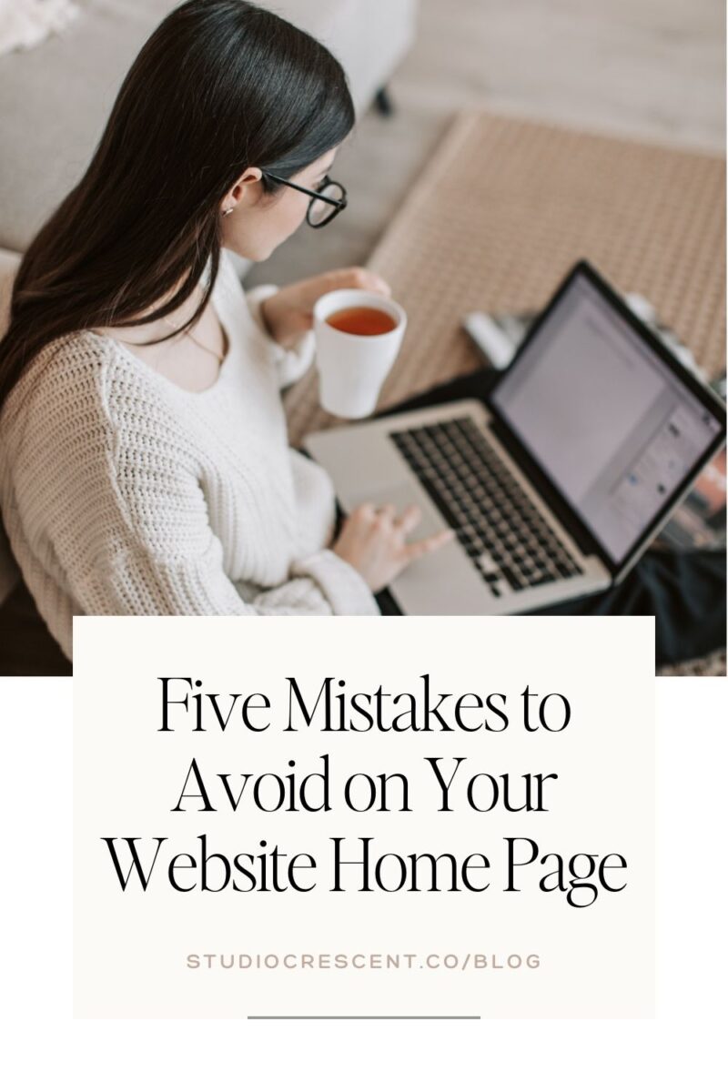 Woman business owner typing on laptop